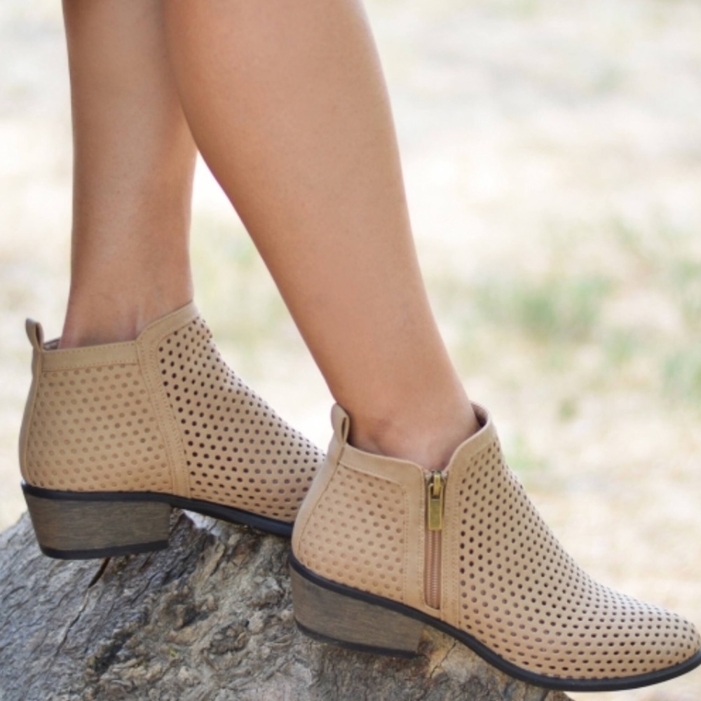 Women Faux Leather Laser Cut Side Zip Ankle Boots